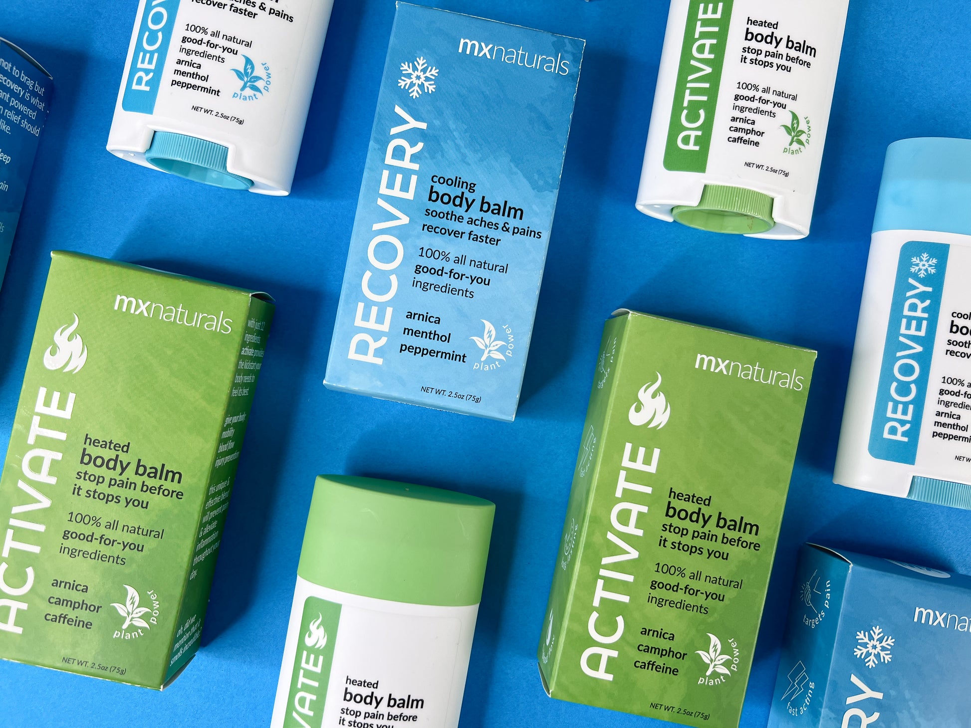 flat lay design of green and white products called activate heated body balm and blue and white recovery cooling body balm alternating on top of a blue background.